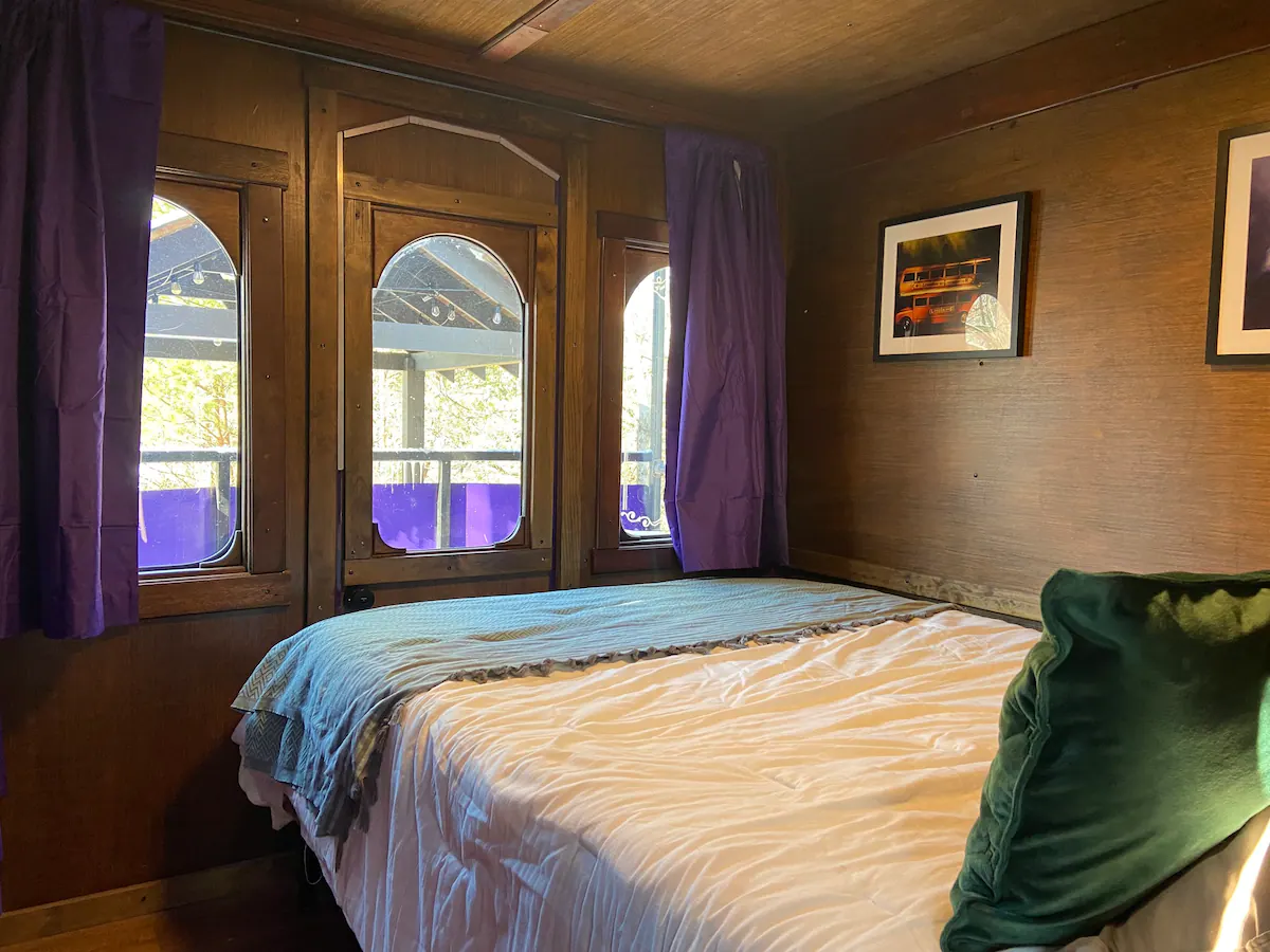 The Wizard’s Trolley’s second bedroom includes a view of the outdoors.