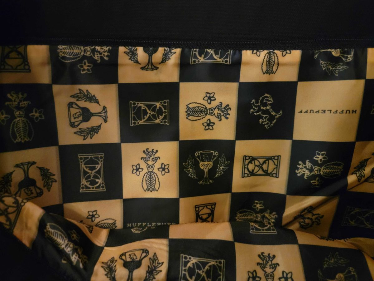 The interior of the Hufflepuff tote at Universal Studios Hollywood features a checkerboard design using the House colors of yellow and black.