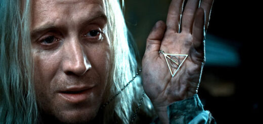 Xenophilius shows off Deathly Hallows necklace.