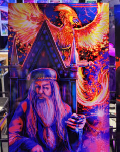 Dumbledore and Fawkes are featured in a colorful print by Pesceffects.