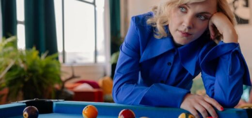 Evanna Lynch poses with a billiards table for a photo shoot with The Italian Reve