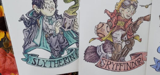 Two art prints based on Slytherin and Gryffindor featured at NYCC 2022.