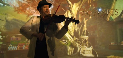Screenshot of "Overture to the Unwritten" music video from "Hogwarts Legacy" with violinist.