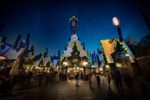 The village of Hogsmeade is lit up for the holidays.