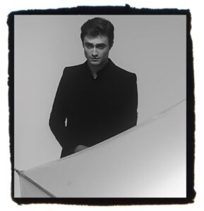 Daniel Radcliffe wearing an all black outfit for "Time Out" magazine