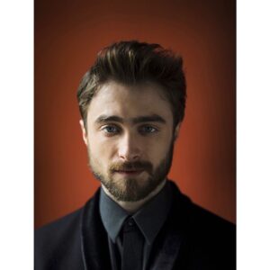 Daniel Radcliffe in a dark suit for "Total Film UK" magazine