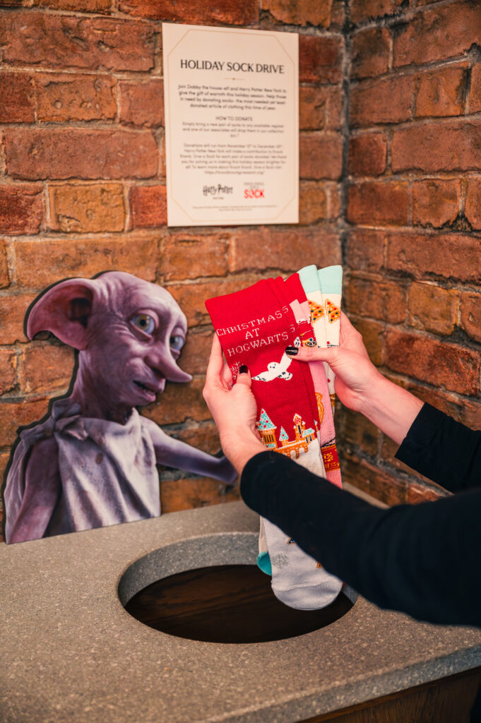 A collection bin as part of Harry Potter New York's sock drive.