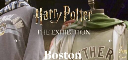 "Harry Potter: The Exhibition" Boston is announced in the foreground. In the background Ravenclaw and Slytherin apparel are on display.